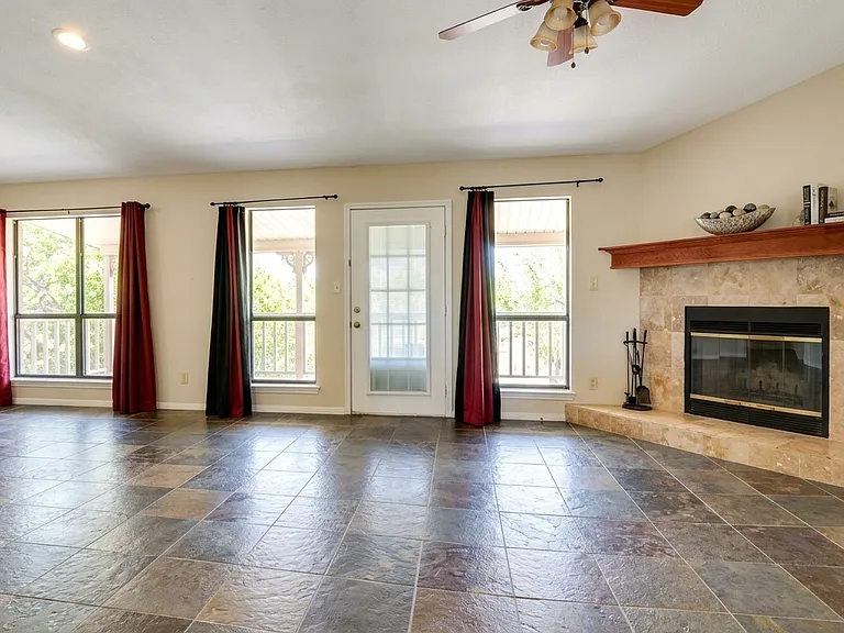 Living Room - Large Windows and Balcony Door