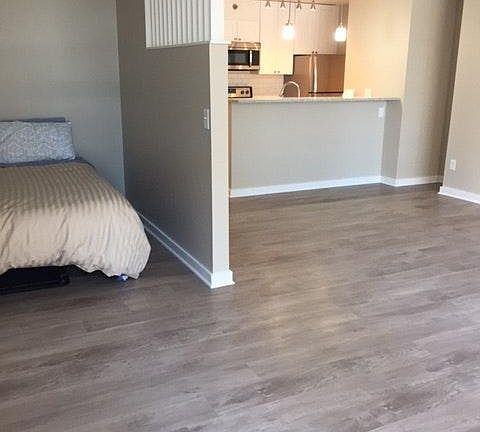 Bed alcove comfortably accommodates a queen size bed