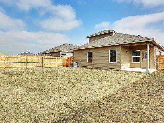 backyard before the raised beds are put in