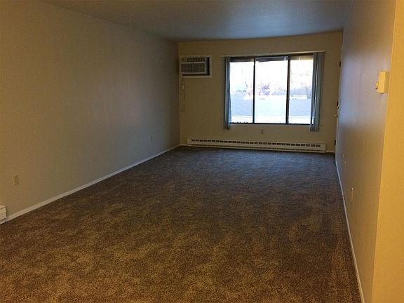 Living area with windows facing the east.