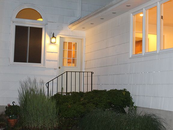 Entrance from Driveway in evening