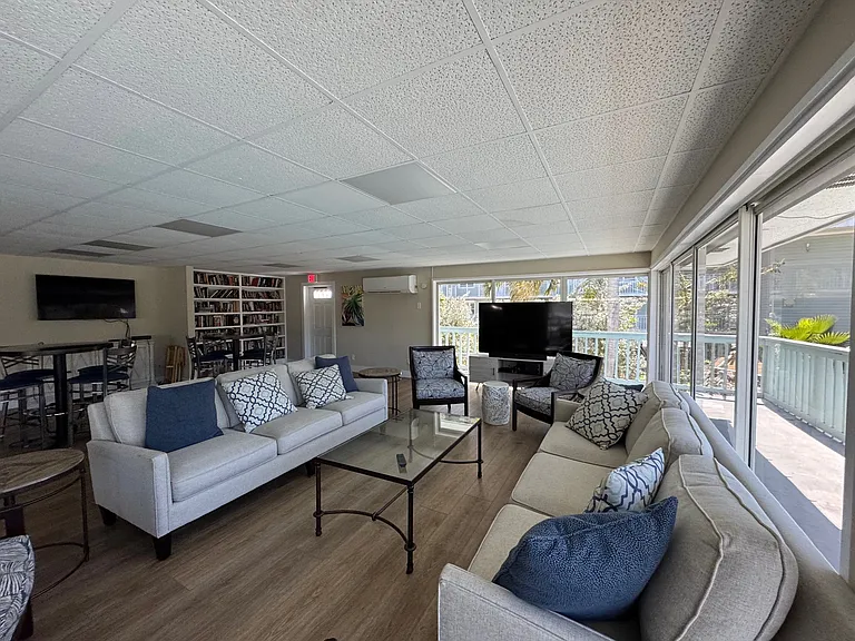 Inside club house offers extra seating and book selection.