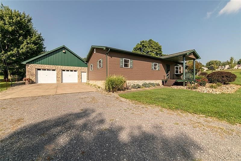 WELCOME TO 124 MOCCASIN HOLLOW ROAD ON 3+ ACRES!