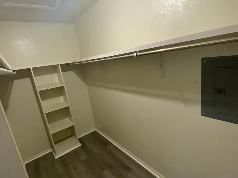 Walk in closet of master bedroom