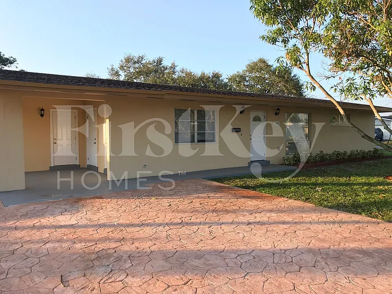 4896 NW 6th Ct — Photo 1