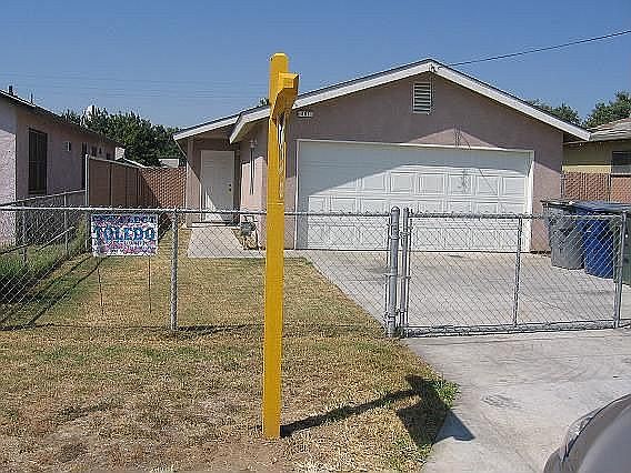 Fenced Front & Back Yard