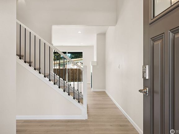 This is a representation only using the same floorplan in the community, but on a diffrerent lot. Co