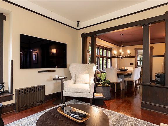 Living room with walkway into dining