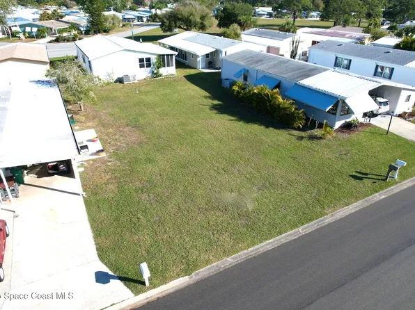 316 Papaya Cir, Barefoot Bay, FL 32976