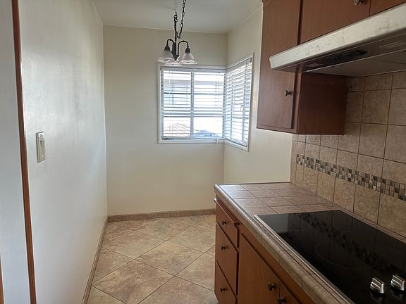 Breakfast nook with overhead lighting.