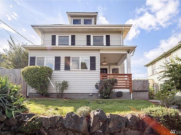 Featuring covered porch and front reading room.