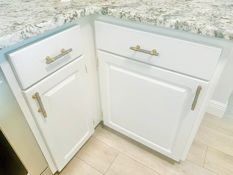 New quartz countertops, updates cabinets with new hardware.
