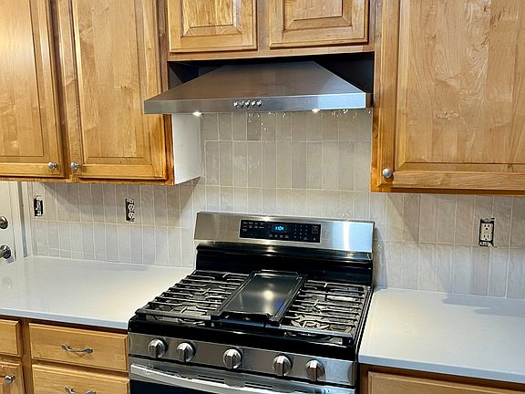 Updated kitchen with new appliances.