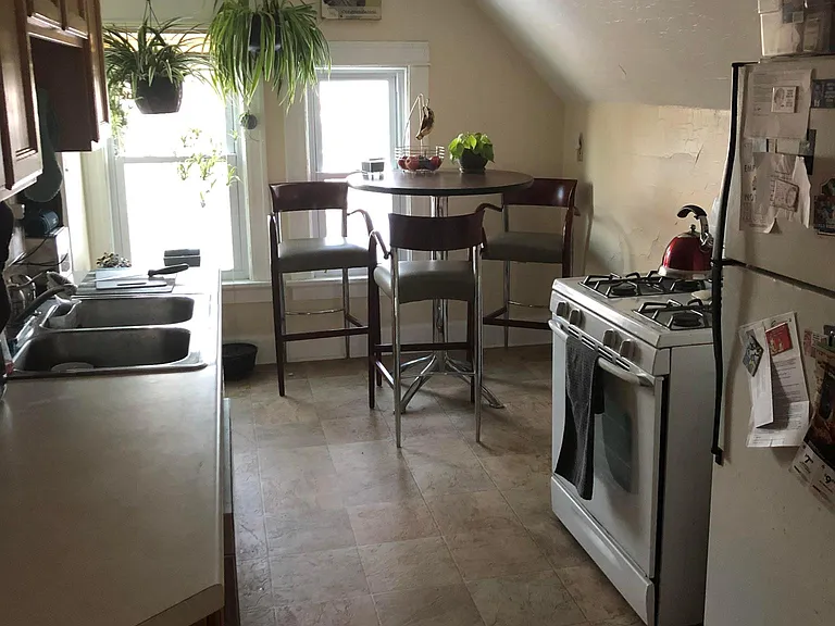 view of kitchen from hall door way