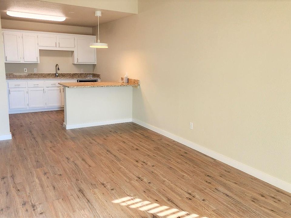 Open Floorplan with peninsula in kitchen that allows seating for up to six people.