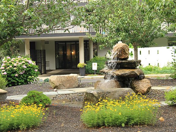 fountain in front of building