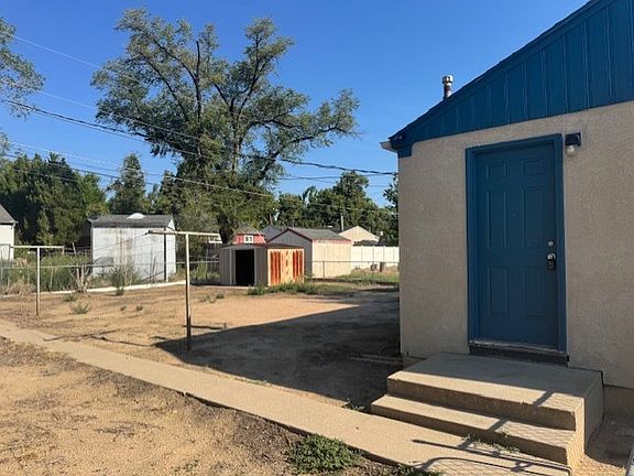 Side Door and Fenced back yard