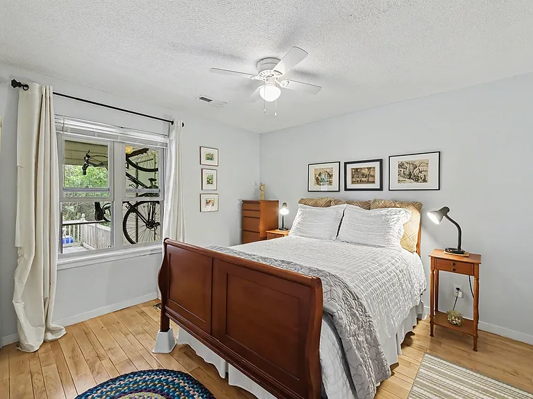 Downstairs bedroom with queen bed