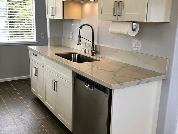 Dishwasher, large sink and sprayer faucet, garbage disposal