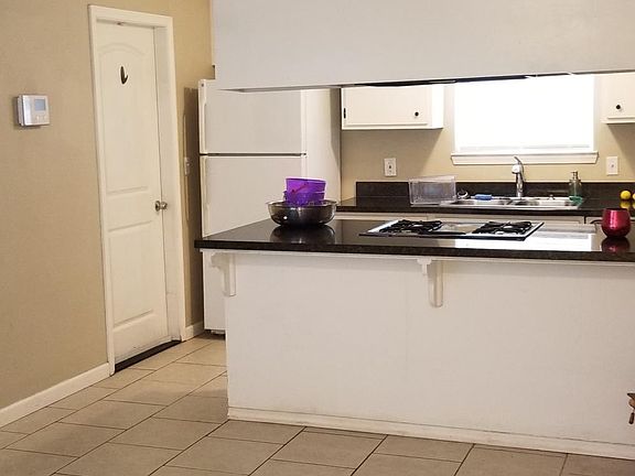 Dinning room and kitchen as seen from entry way.