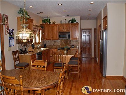 Large Kitchen with Granite and Stainless Steel appliances