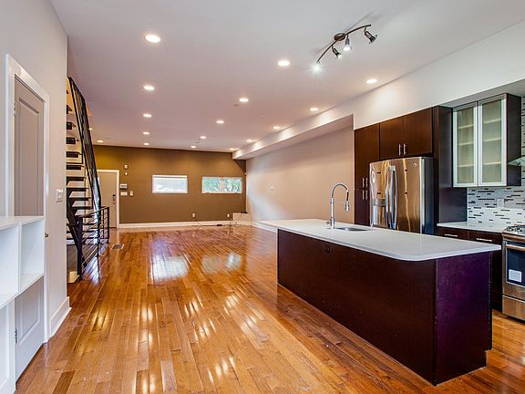 Wide open concept floor-plan makes this townhome feel like a suburban single family home