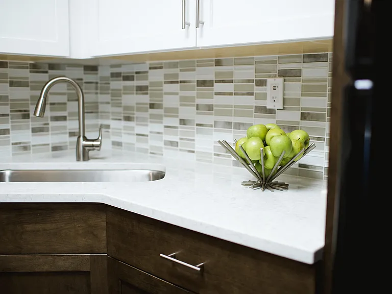 Quartz countertops and farmhouse sink