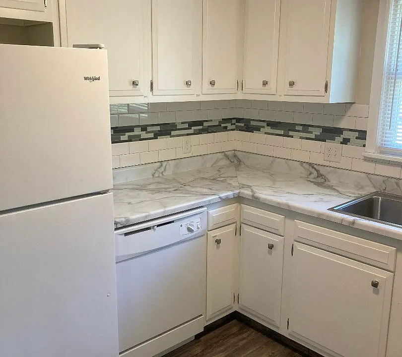 Plenty of cabinets, fits many small appliances as well.