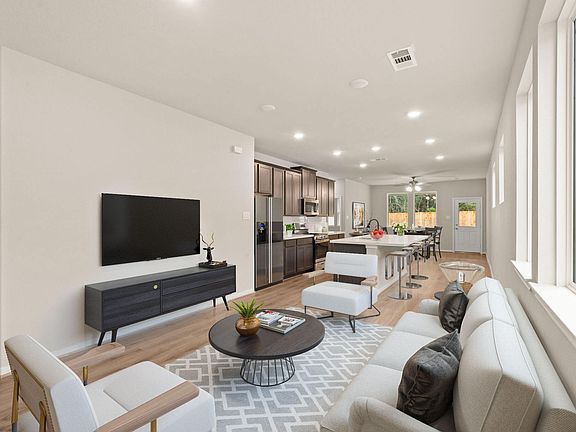 This home boasts a spacious open concept layout that combines the best of modern design and comfort