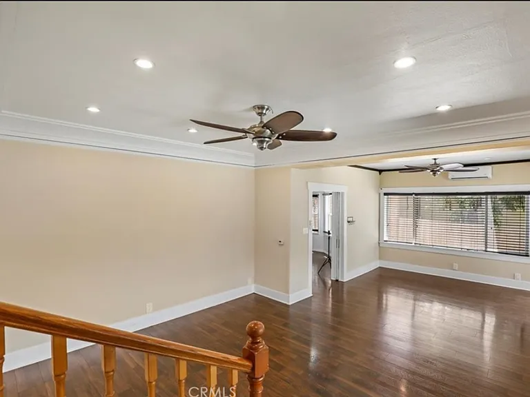 Stairs from upstairs leading into the living room