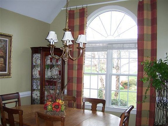 Separate Dining Room also has Cathedral cielings and modern paint.