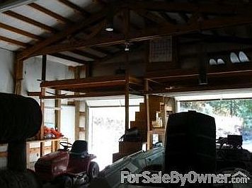 Garage
						:
						2 car garage with tons of storage space above