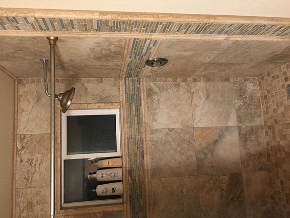 Delete: above stone tile photo is not this property