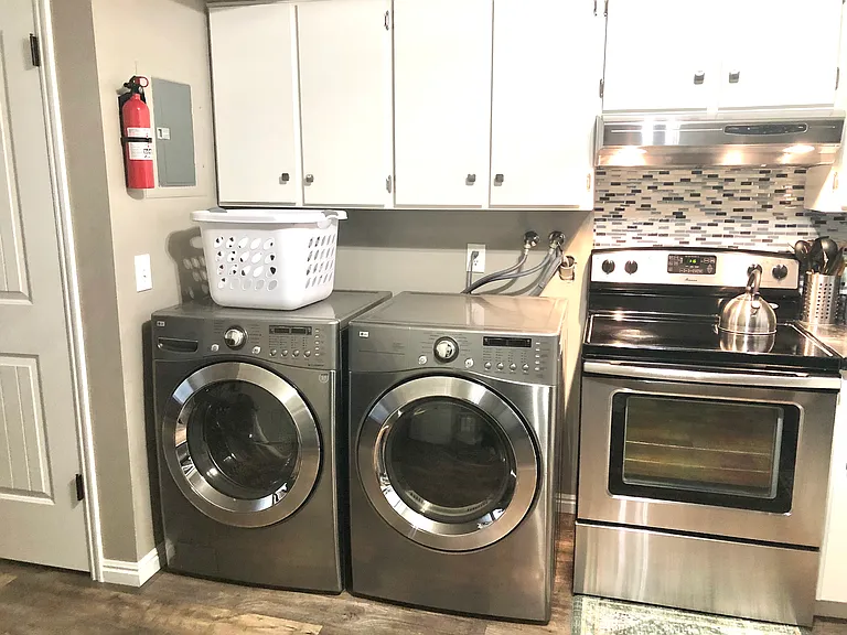 Full size front load washer and dryer.