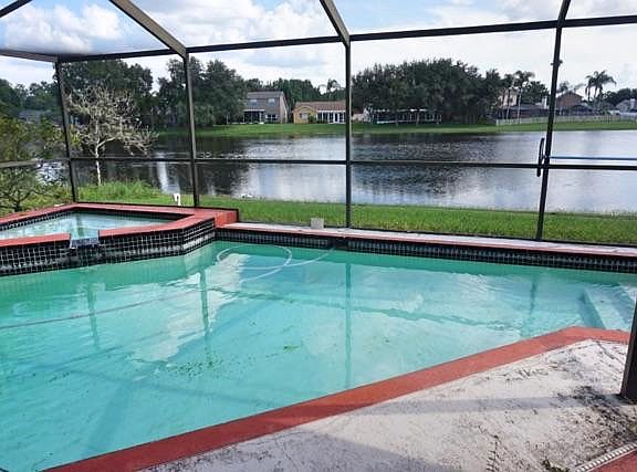 Pool area with lake view