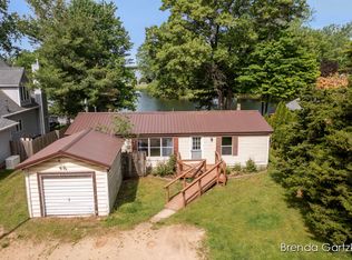 8761 Huron Dr, Howard City, MI 49329