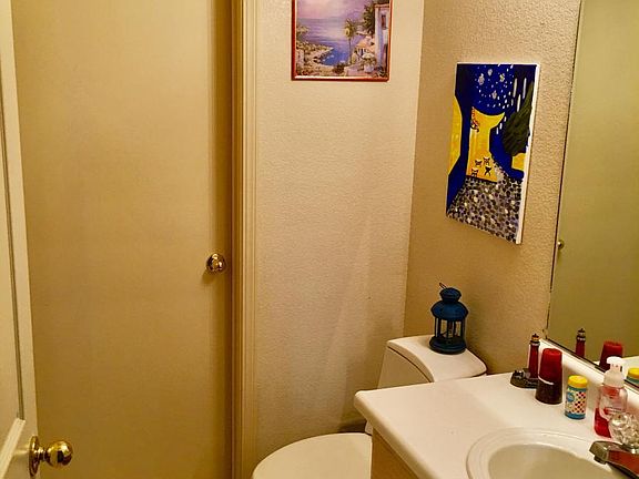 1/2 bath (closed door leads to laundry room)