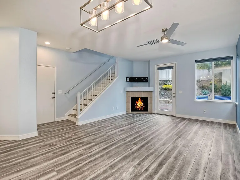 Living Room/Stairs/Back Yard Door