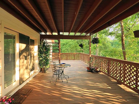 Sprawling decks welcome you home - your waterfront oasis - secluded, yet minutes away from all ameni