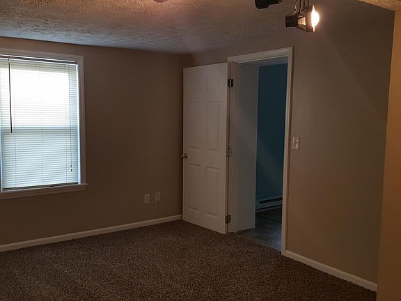 Bedroom 1 with closet and window on west end of apartment