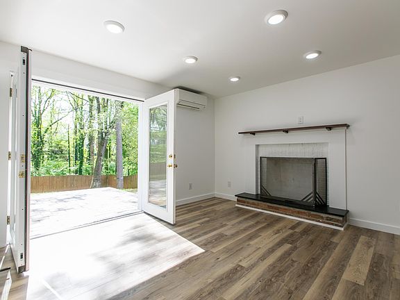 Living Room with french doors leading to back yard and private patio.