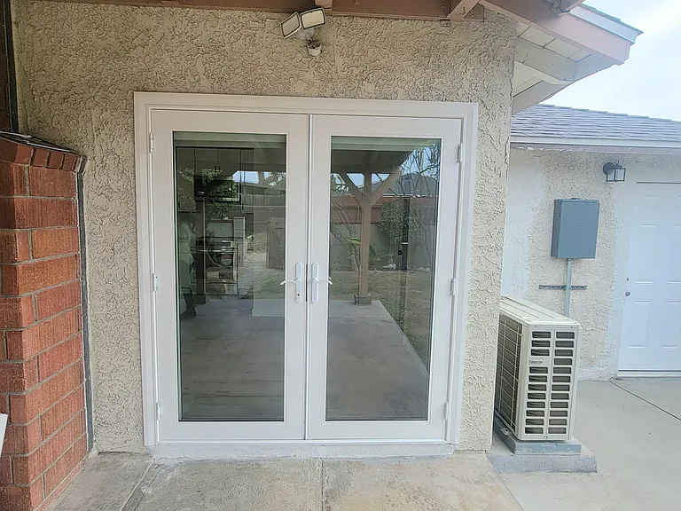 This is your entrance! Brand new french doors! Oh la la!
