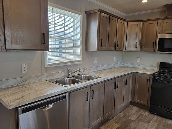 4th image of 38000 Le Chateau Blvd #487