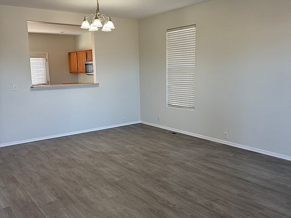 All new Luxury Vinyl Plank in the living room, dining area, kitchen, and bathrooms!!