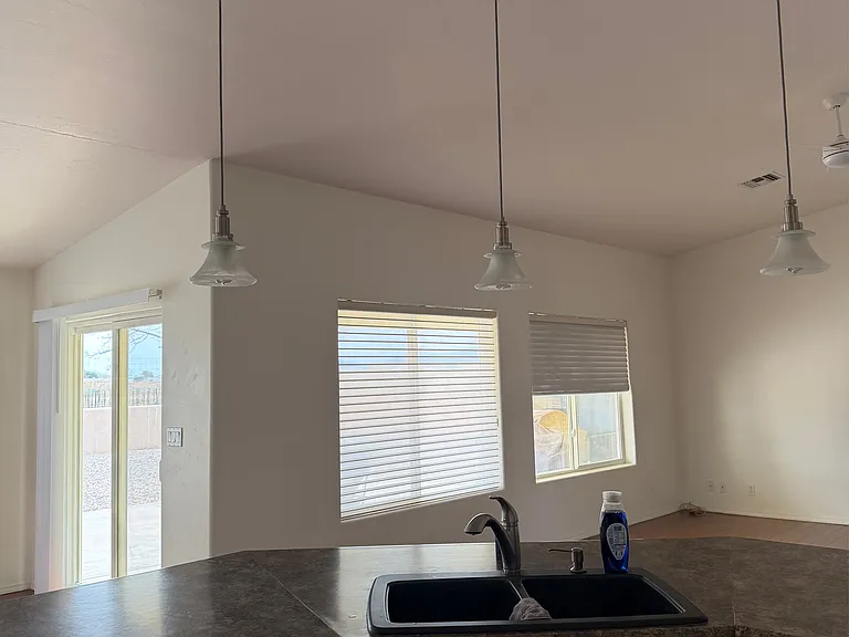 Kitchen viewing living room