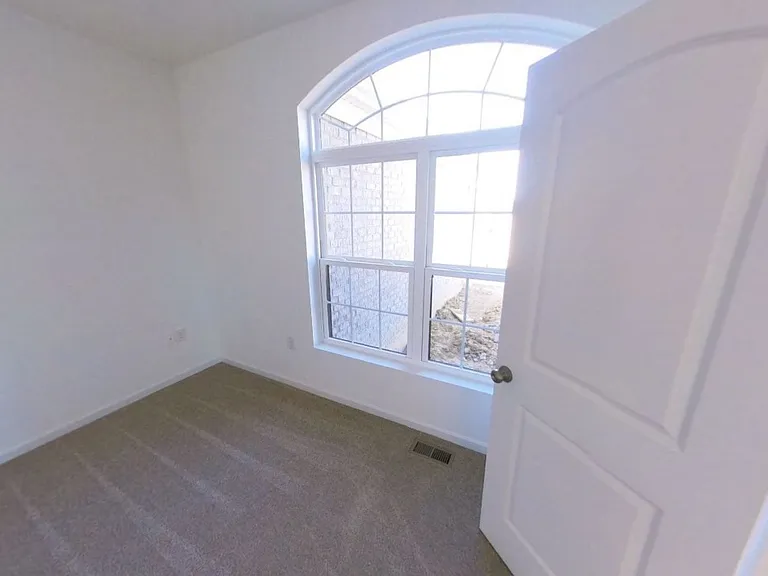 Downstairs Bonus Room located on main floor (ideal for study/office, playroom, or guest room)