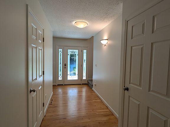 Front entrance as seen from the kitchen. The entire house interior has been freshly painted, professionally cleaned.