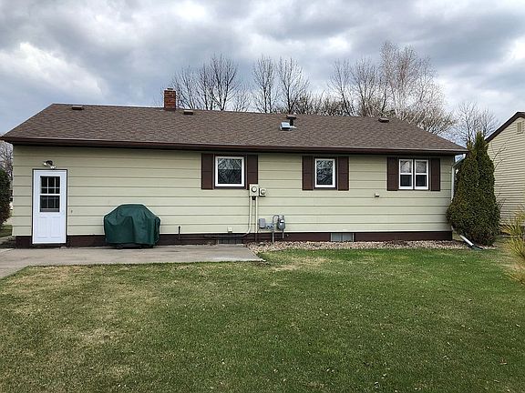 Back of house with patio
