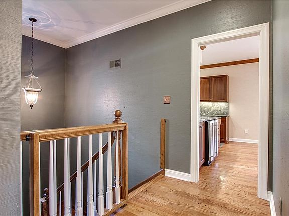 Foyer stairs to lower level.