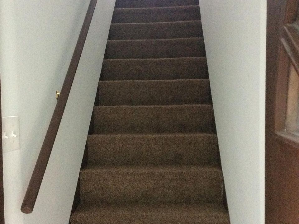 Stairs from front door or private parking garage  